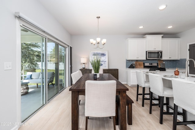 21 Vicksburg Dr, Saint Johns, FL 32259 - dining room with a chandelier, light wood-type flooring, and recessed lighting