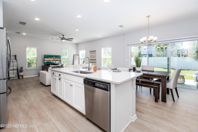 21 Vicksburg Dr, Saint Johns, FL 32259 - kitchen with appliances with stainless steel finishes, white cabinetry, healthy amount of natural light, a chandelier, and recessed lighting