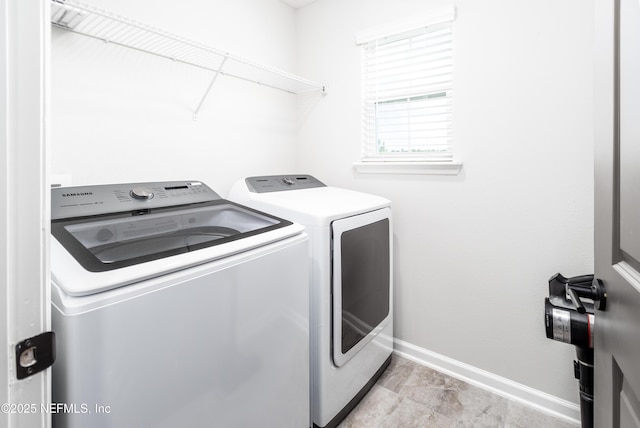 21 Vicksburg Dr, Saint Johns, FL 32259 - laundry area with washer and clothes dryer and baseboards