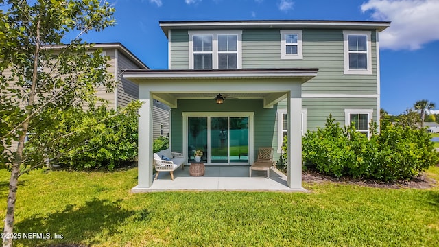 21 Vicksburg Dr, Saint Johns, FL 32259 - back of house with a ceiling fan, a yard, and a patio