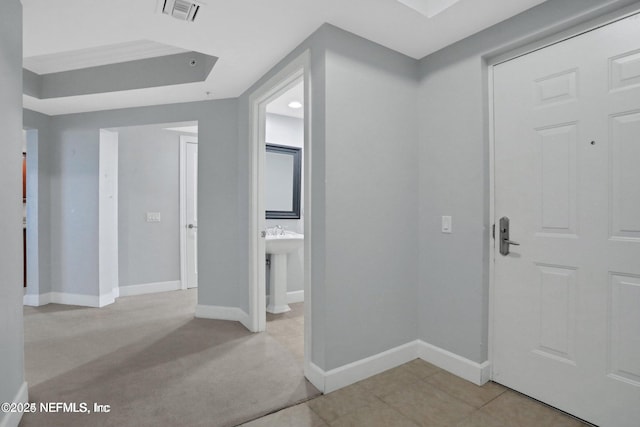 1031 1st St S Unit 504, Jacksonville Beach, FL 32250 - entryway with baseboards and light carpet
