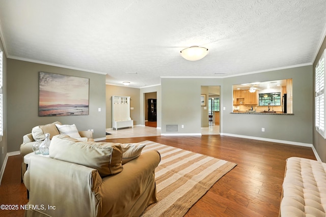 726 Arran Ct, Orange Park, FL 32073 - living room with wood finished floors and ornamental molding