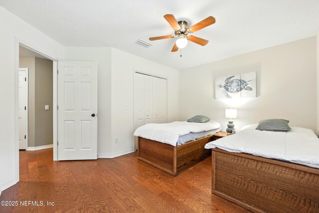 726 Arran Ct, Orange Park, FL 32073 - bedroom with wood finished floors, a closet, and ceiling fan