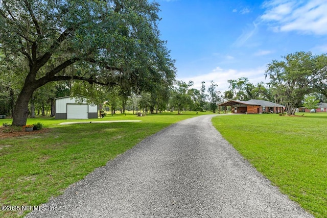 26122 Sheared Stokes Rd, Hilliard, FL 32046 - view of asphalt driveway