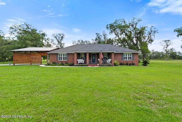 26122 Sheared Stokes Rd, Hilliard, FL 32046 - single story home with covered porch and a front yard