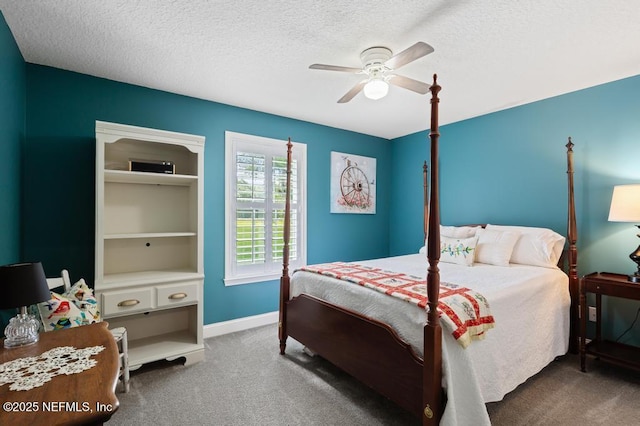 26122 Sheared Stokes Rd, Hilliard, FL 32046 - carpeted bedroom featuring a textured ceiling and a ceiling fan
