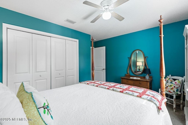 26122 Sheared Stokes Rd, Hilliard, FL 32046 - carpeted bedroom with a closet and ceiling fan