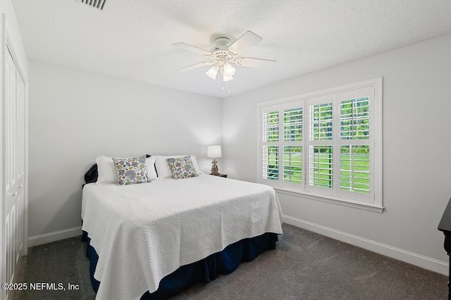 26122 Sheared Stokes Rd, Hilliard, FL 32046 - carpeted bedroom featuring baseboards and a ceiling fan