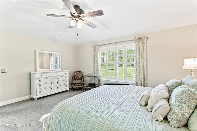 26122 Sheared Stokes Rd, Hilliard, FL 32046 - carpeted bedroom with multiple windows and a ceiling fan