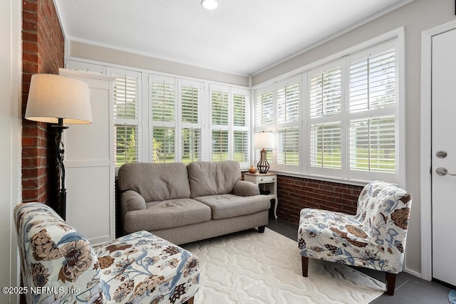 26122 Sheared Stokes Rd, Hilliard, FL 32046 - living area featuring brick wall and tile patterned flooring