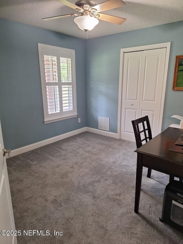 26122 Sheared Stokes Rd, Hilliard, FL 32046 - unfurnished office with a ceiling fan, carpet flooring, and a textured ceiling