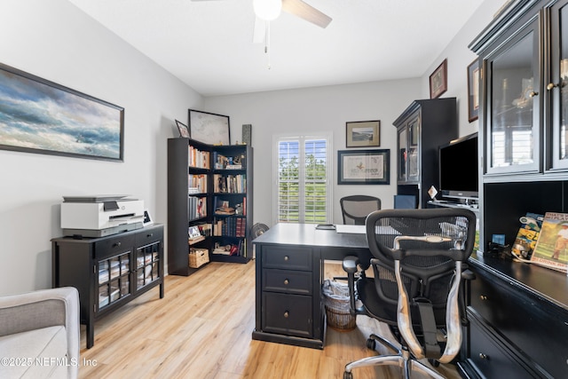 1317 Garrison Dr, Saint Augustine, FL 32092 - home office featuring light wood finished floors and ceiling fan