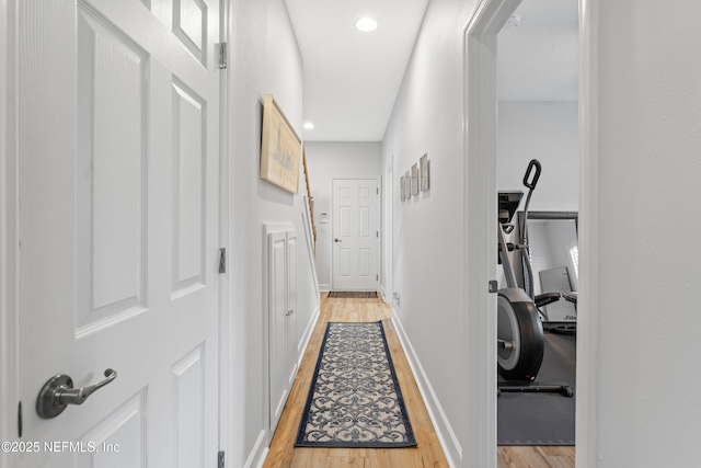 1317 Garrison Dr, Saint Augustine, FL 32092 - hallway with light wood-style floors and recessed lighting