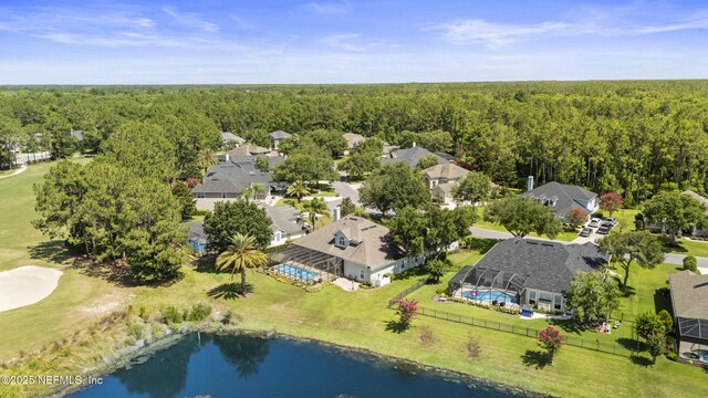 1317 Garrison Dr, Saint Augustine, FL 32092 - aerial view of residential area featuring a heavily wooded area and a large body of water
