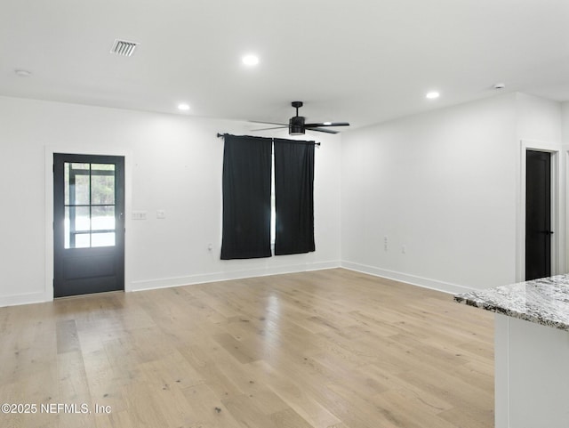 432 SE 55th St, Keystone Heights, FL 32656 - unfurnished living room featuring light wood finished floors, recessed lighting, and a ceiling fan