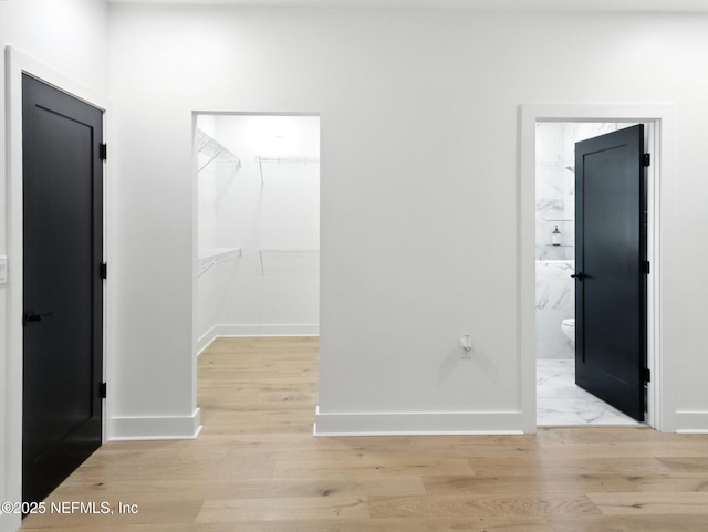 432 SE 55th St, Keystone Heights, FL 32656 - corridor featuring light wood finished floors and baseboards