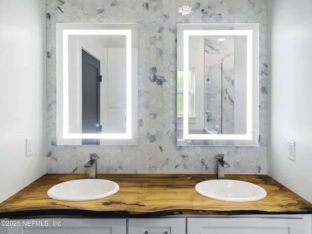 432 SE 55th St, Keystone Heights, FL 32656 - full bath featuring double vanity, a marble finish shower, and tasteful backsplash