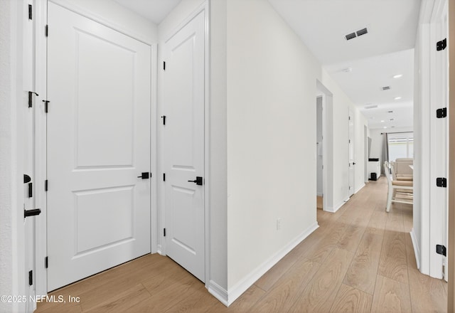 322 Fairlake Cir, Saint Augustine, FL 32092 - hallway with light wood-style floors and recessed lighting