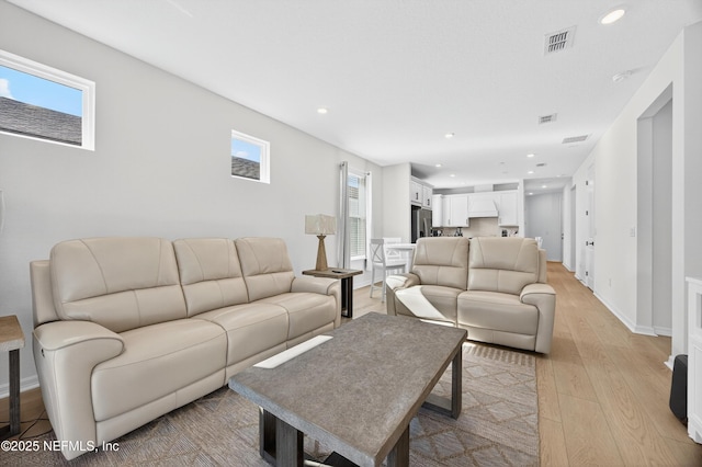 322 Fairlake Cir, Saint Augustine, FL 32092 - living area with light wood-style flooring and recessed lighting