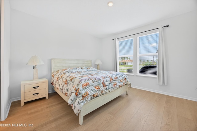 322 Fairlake Cir, Saint Augustine, FL 32092 - bedroom featuring light wood-style floors and baseboards
