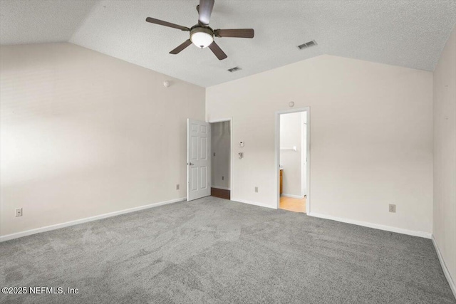 1385 Soaring Flight Way, Jacksonville, FL 32225 - unfurnished bedroom with vaulted ceiling, carpet floors, a textured ceiling, and a ceiling fan