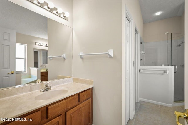 1385 Soaring Flight Way, Jacksonville, FL 32225 - bathroom with vanity, a shower stall, a textured ceiling, tile patterned floors, and a garden tub