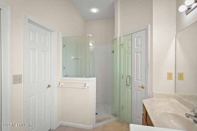 1385 Soaring Flight Way, Jacksonville, FL 32225 - bathroom with a shower stall, vanity, tile patterned floors, and a textured ceiling