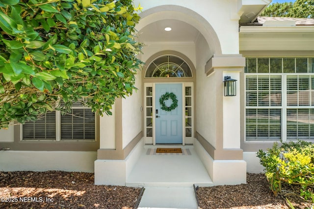 4342 Richmond Park Dr E, Jacksonville, FL 32224 - doorway to property featuring stucco siding