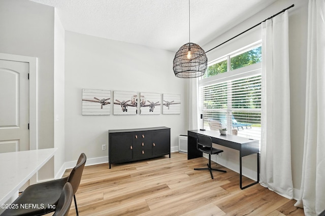 4342 Richmond Park Dr E, Jacksonville, FL 32224 - office area featuring light wood-style flooring and a textured ceiling