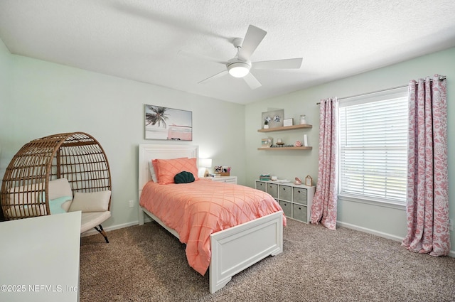 4342 Richmond Park Dr E, Jacksonville, FL 32224 - carpeted bedroom with ceiling fan and a textured ceiling