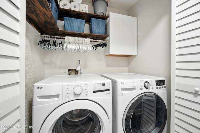 4342 Richmond Park Dr E, Jacksonville, FL 32224 - laundry room featuring washing machine and dryer and cabinet space