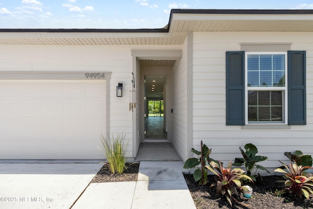 94954 Colnago Ct, Fernandina Beach, FL 32034 - entrance to property featuring a garage and driveway