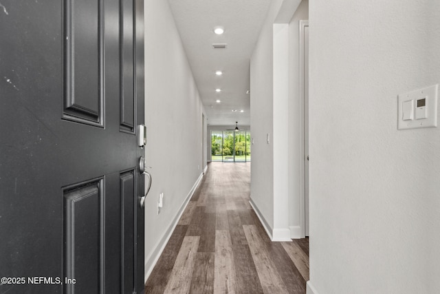 94954 Colnago Ct, Fernandina Beach, FL 32034 - hall with dark wood-type flooring and recessed lighting