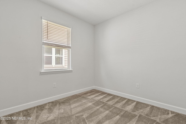 94954 Colnago Ct, Fernandina Beach, FL 32034 - spare room with carpet flooring and baseboards
