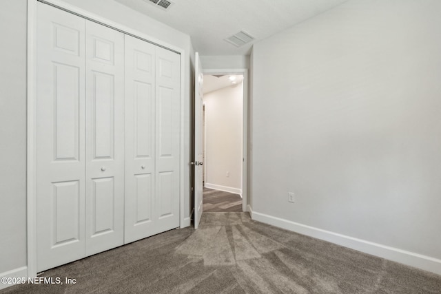 94954 Colnago Ct, Fernandina Beach, FL 32034 - unfurnished bedroom featuring carpet flooring and a closet