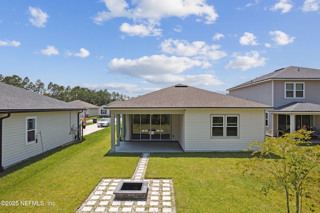 94954 Colnago Ct, Fernandina Beach, FL 32034 - back of house with a patio, a yard, and a fire pit