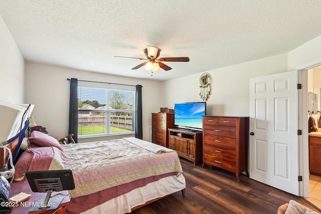 2947 Vianey Pl, Green Cove Springs, FL 32043 - bedroom featuring dark wood-style floors, a textured ceiling, and a ceiling fan