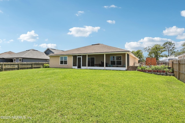2947 Vianey Pl, Green Cove Springs, FL 32043 - back of house featuring a fenced backyard, a sunroom, stucco siding, and roof with shingles