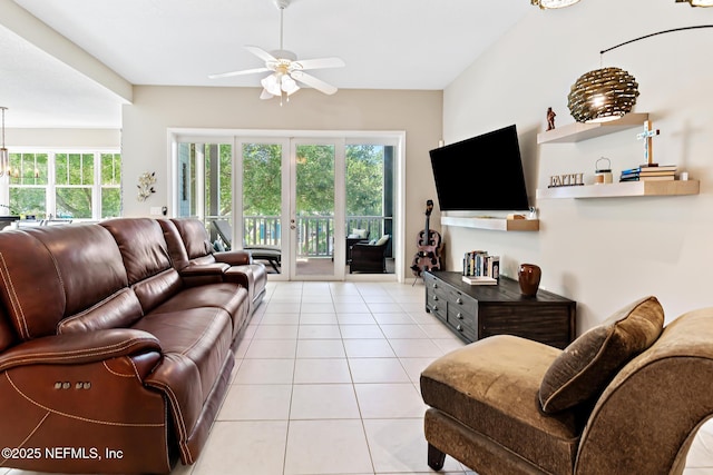 308 High Tide Dr Unit 201, Saint Augustine, FL 32080 - living area with ceiling fan, light tile patterned floors, and healthy amount of natural light