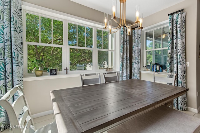 308 High Tide Dr Unit 201, Saint Augustine, FL 32080 - dining space featuring a chandelier and tile patterned flooring