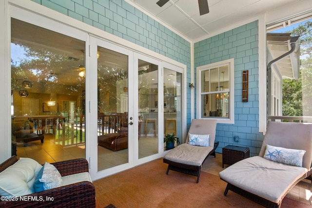 308 High Tide Dr Unit 201, Saint Augustine, FL 32080 - sunroom / solarium with a ceiling fan, french doors, and plenty of natural light