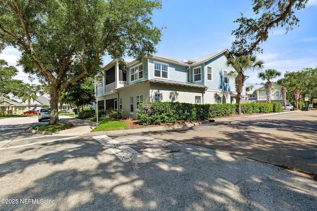 308 High Tide Dr Unit 201, Saint Augustine, FL 32080 - view of front of home featuring stucco siding