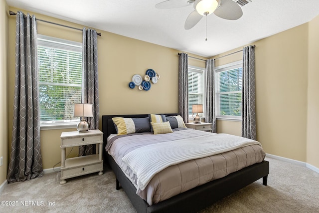308 High Tide Dr Unit 201, Saint Augustine, FL 32080 - bedroom featuring carpet flooring, multiple windows, and a ceiling fan