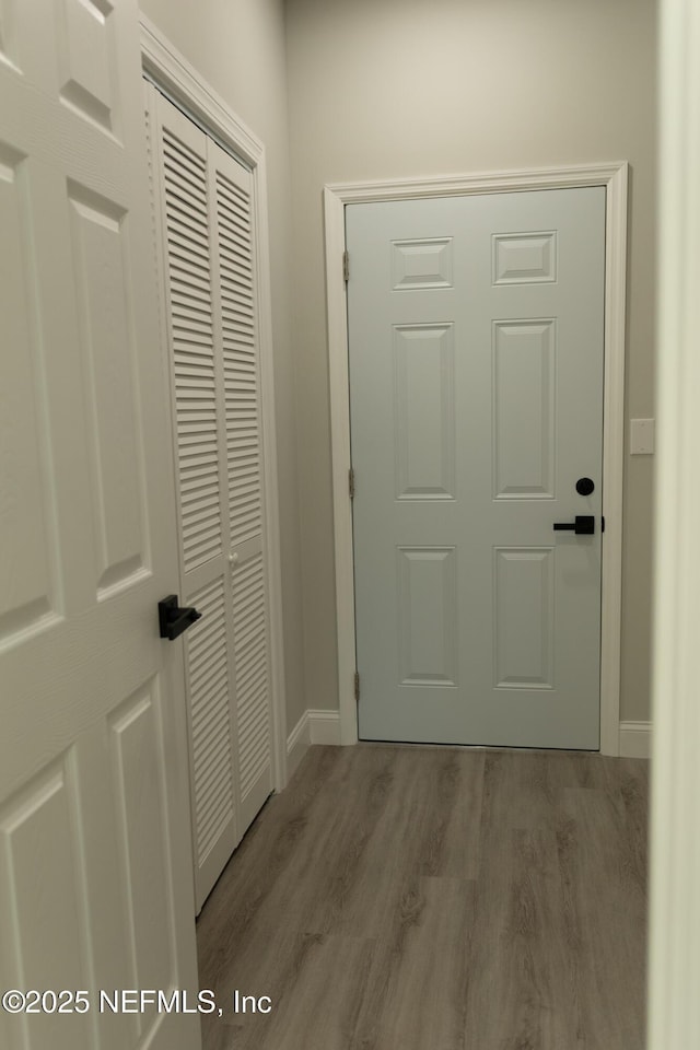5408 Potomac Ave, Jacksonville, FL 32254 - doorway to outside featuring wood finished floors and baseboards