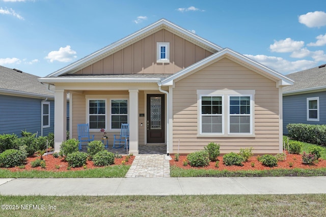 48 Gilchrist Way, Saint Johns, FL 32092 - bungalow-style home featuring a porch and board and batten siding