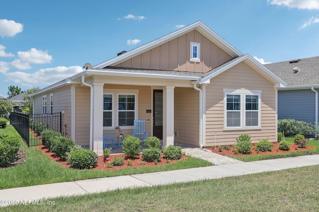 48 Gilchrist Way, Saint Johns, FL 32092 - view of front facade featuring a porch and board and batten siding