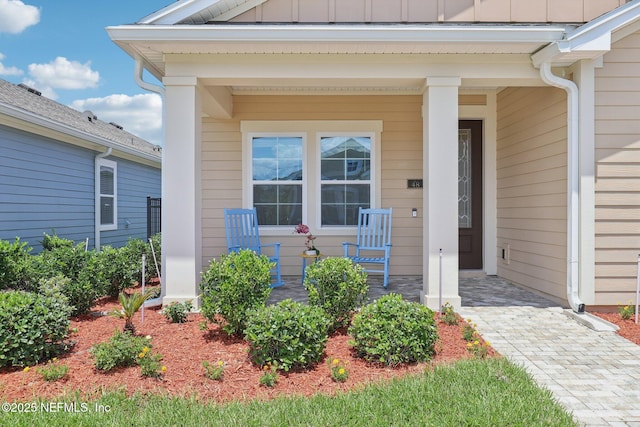 48 Gilchrist Way, Saint Johns, FL 32092 - entrance to property with covered porch and board and batten siding
