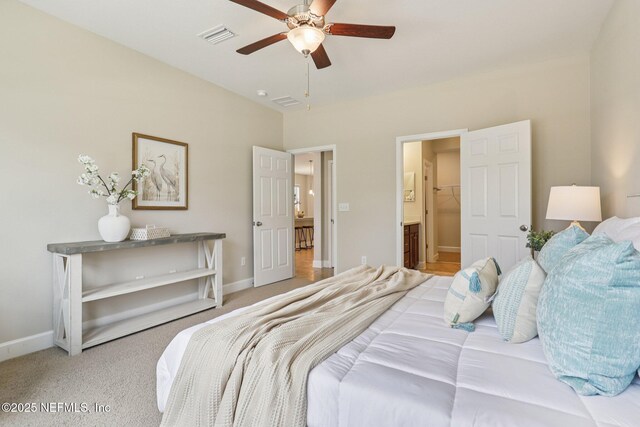 48 Gilchrist Way, Saint Johns, FL 32092 - bedroom with carpet floors, ensuite bath, and a ceiling fan