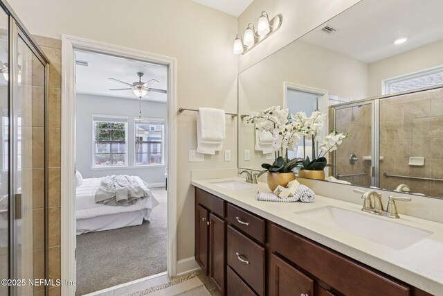 48 Gilchrist Way, Saint Johns, FL 32092 - bathroom featuring connected bathroom, double vanity, a shower stall, and ceiling fan