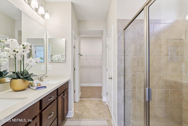 48 Gilchrist Way, Saint Johns, FL 32092 - full bath featuring double vanity, a stall shower, and a walk in closet